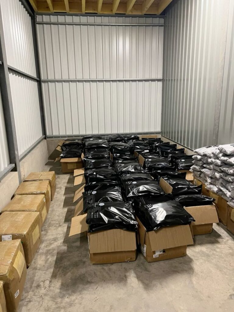 Finished custom garments folded and prepared for packaging