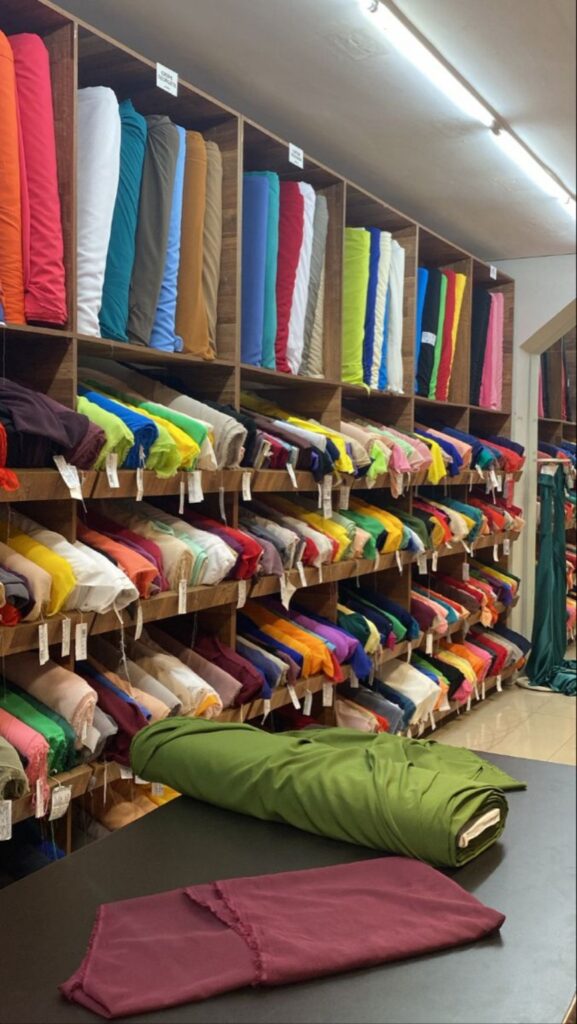 Fabric rolls prepared for custom apparel material selection