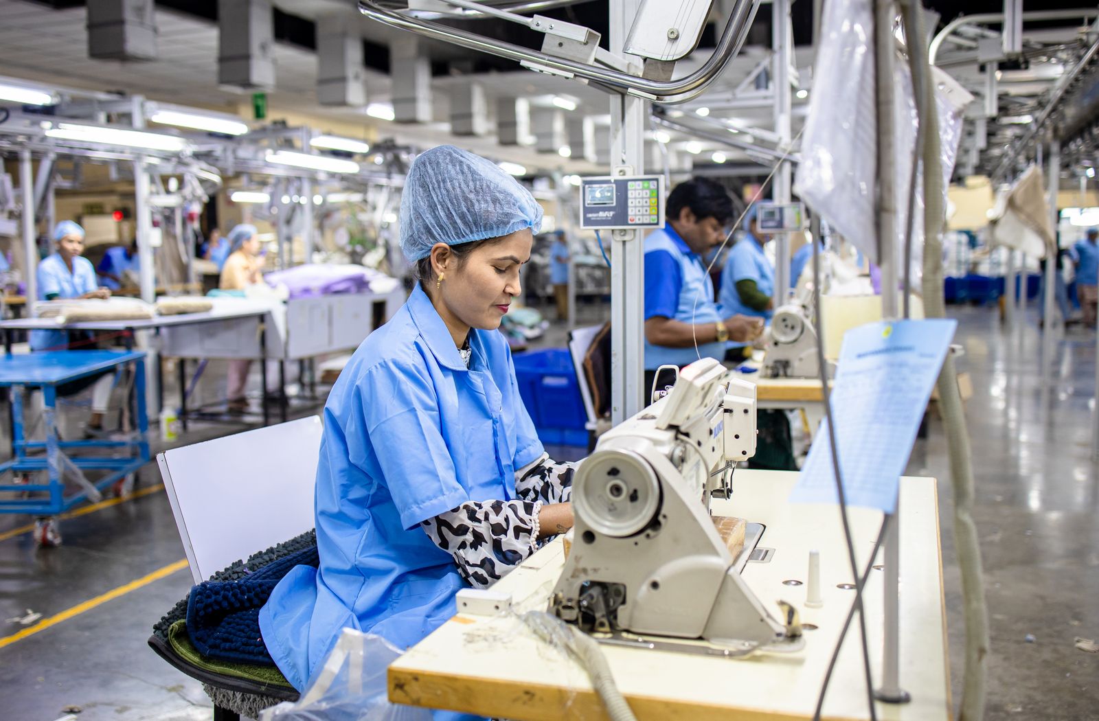 Industrial garment sewing — illustrative stock photograph